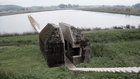 Movie shows concrete bunker cut in half by RAAAF and Atelier de Lyon