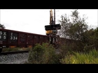Must See! Maintenance Vehicle Straddles two Railroad Cars, Wednesday 11/13/13