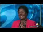 News anchor proudly whips off wig on live TV