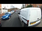 Cyclist chased down and punched to the ground by pissed off driver.