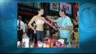 Artist Painting On Nude Models In Times Square