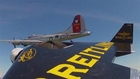 Jetman Yves Rossy flies alongside B17 plane